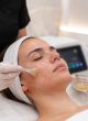 BioRePeel Facial for Acne-Prone Skin in Reading Skincare practitioner applying a professional facial peel to acne-prone skin