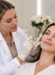 Dermal Fillers Treatment in Reading Aesthetic practitioner performing a facial dermal filler treatment at a modern clinic